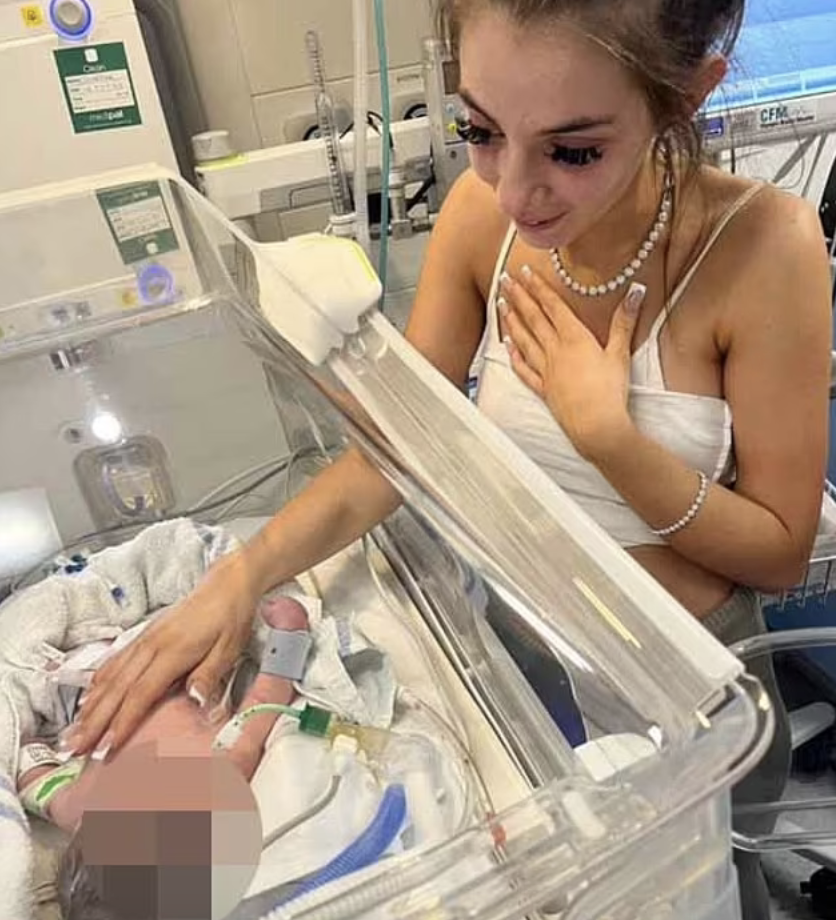 little Posey with her sister Demi at the hospital